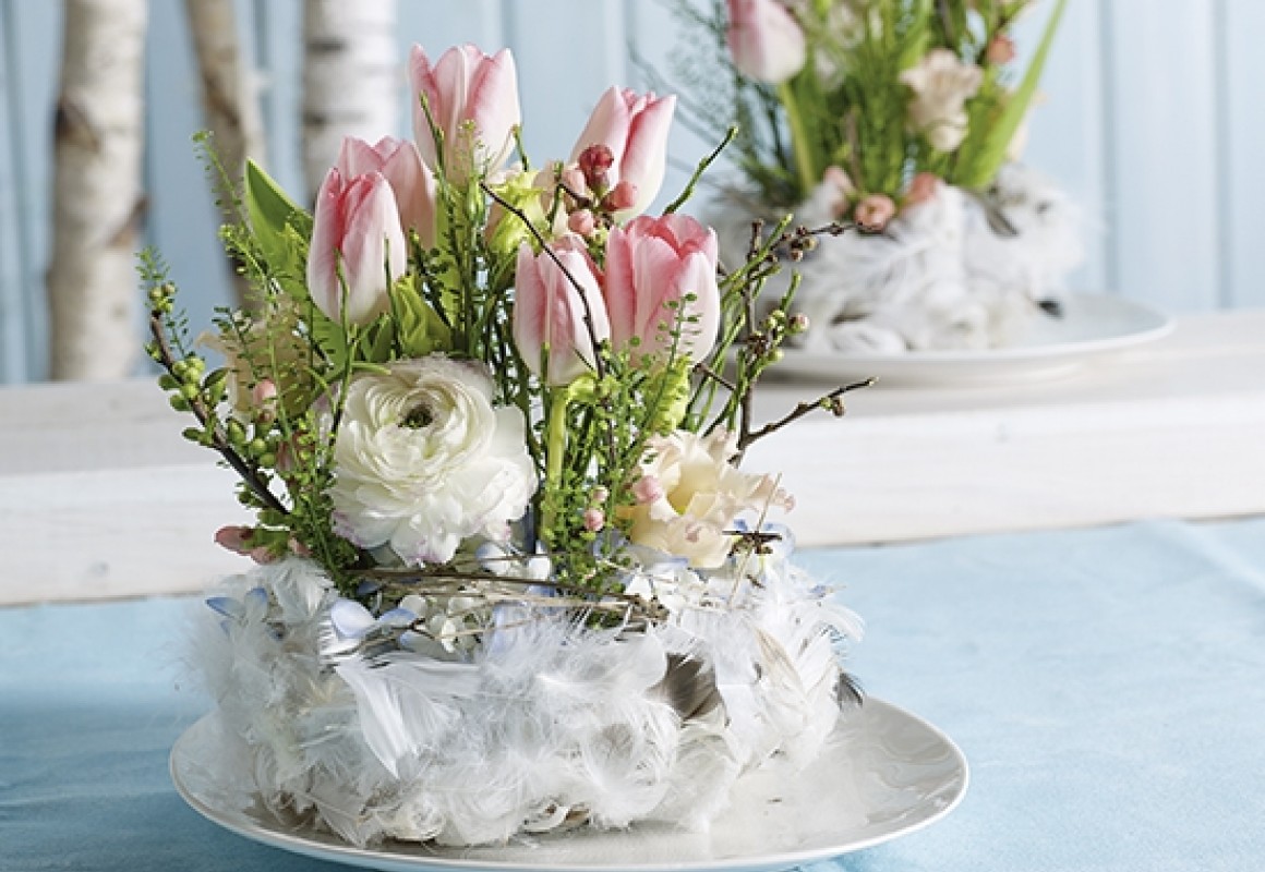 Spring nest with feathers